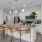 Four wicker high tops at kitchen island