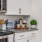 Coffee cups in corner of kitchen counter